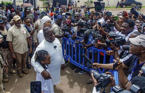 Sierra Leone holds presidential election with an incumbent weakened by economic turmoil